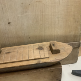 Houten bootje, volkskunst
