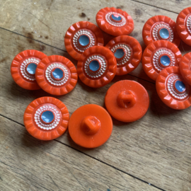 Oranje glazen knopen