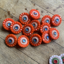 Oranje glazen knopen