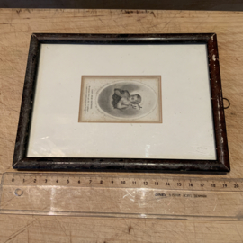 Een ingelijst bidprentje