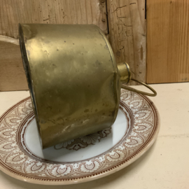 Een koperen cloche