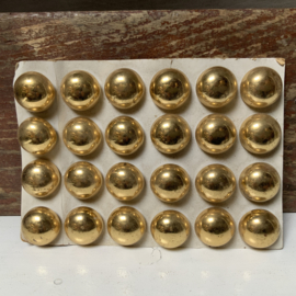 Kaart met “ gouden” knopen