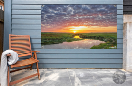 De Slufter tijdens zonsondergang, ringen in de hoeken.