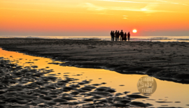 Zonsondergang op Texel, ringen in de hoeken.
