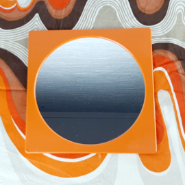 Jaren 70 wandspiegel, kunstof oranje spiegel