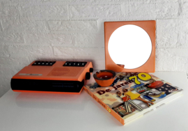 Jaren 70 wandspiegel, kunstof oranje spiegel