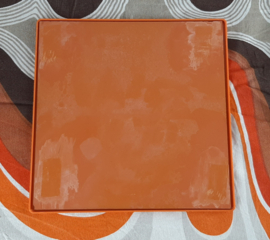 Jaren 70 wandspiegel, kunstof oranje spiegel