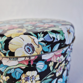 Vintage koektrommel met bloemenmotief