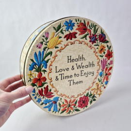 Vintage koekblik "Health, Love & Wealth & Time to Enjoy Them"
