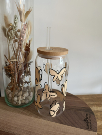 Drinkglas met beige vlinders