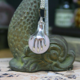 Spiritual necklace of two hands holding a Rose Quartz sphere