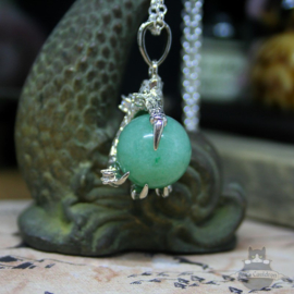 Dragonclaw necklace holding an Aventurine