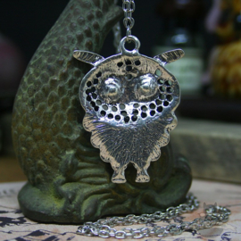 Owl necklace with dark eyes silver colored