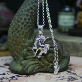 Small unicorn necklace silver colored