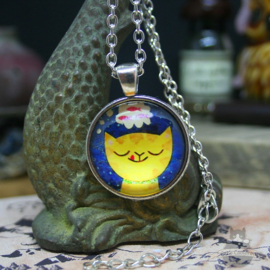 Yellow cartoon cat in round pendant necklace