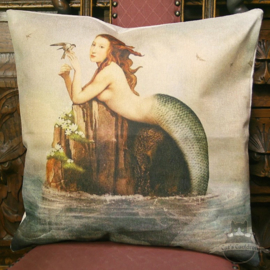 Mermaid laying on a rock with small bird pillowcase