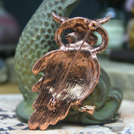 Brown owl brooch decorated with stones