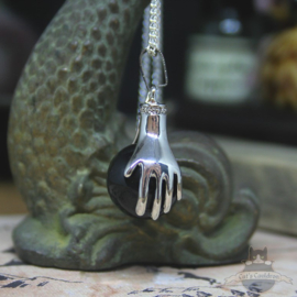 Spiritual necklace of two hands holding a Black Agate sphere