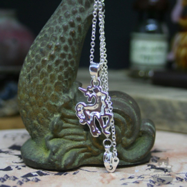 Small unicorn necklace silver colored