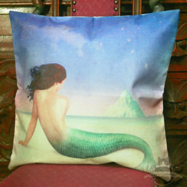Mermaid on a beach looking at an iceberg pillowcase