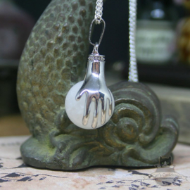 Spiritual necklace of two hands holding a Rock Crystal sphere
