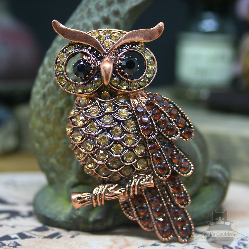 Brown owl brooch decorated with stones