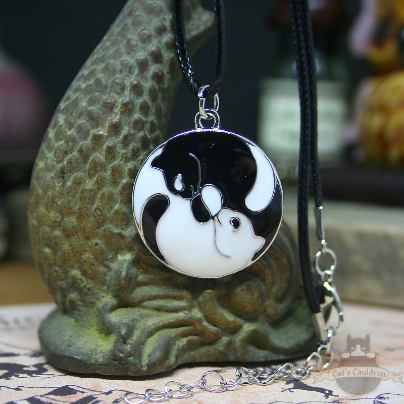 Yin Yang black and white enameled cat necklace