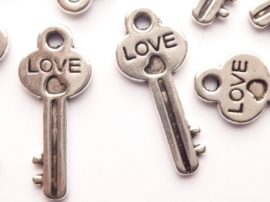CH.317.10- 10 stuks bedels/hangers sleutels 25x10mm staalkleur SUPERLAGE PRIJS!