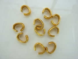 001505- 10 stuks stevige ovale ringen van 10x6mm goudkleur OPRUIMING