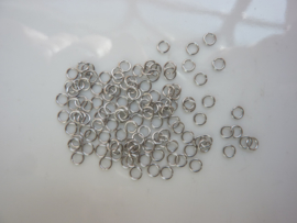 ca. 100 stuks enkele ringetjes van 3mm staalkleur