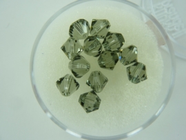 2207 858- 12 stuks swarovski kralen toupille black diamond 6mm in een doosje OPRUIMING