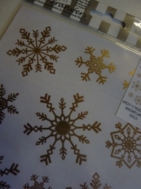 005006.C- Rub-on transfer snowflakes goud 24x14cm OPRUIMING