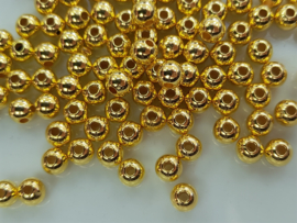 2147 - ca. 100 stuks kunststof parels van 6 mm goudkleur