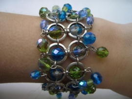 armband geketteld met ringen