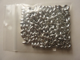 02556- ca. 200 x ovale "rijstekorrel" kunststof parels 6x3mm zilver