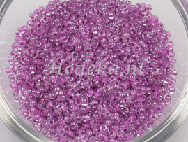 CRP10/62  12 gram Preciosa Rocailles 10/0 Transparant magenta kern