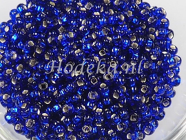 CRP08/56  12 gram Preciosa Rocailles 8/0 Donker Blauw silverlined