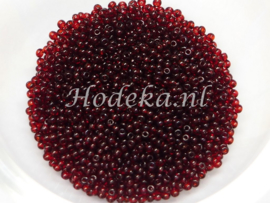 CRP15/20  12 gram Preciosa Rocailles 15/0 Heel Donker Rood transparant