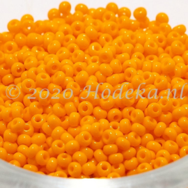 CRP10/87a  50 gram Preciosa Rocailles 10/0 Licht Oranje