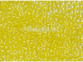 CRP10/02a  50 gram Preciosa Rocailles 10/0 Tranparant yellowlined