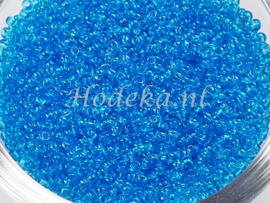 CRP11/50  12 gram Preciosa Rocailles 11/0 Blauw transparant