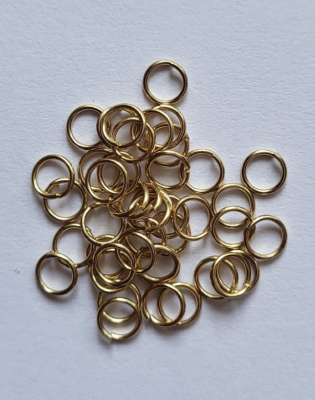 BHR41  40 ringetjes 4mm  RVS Goudkleur