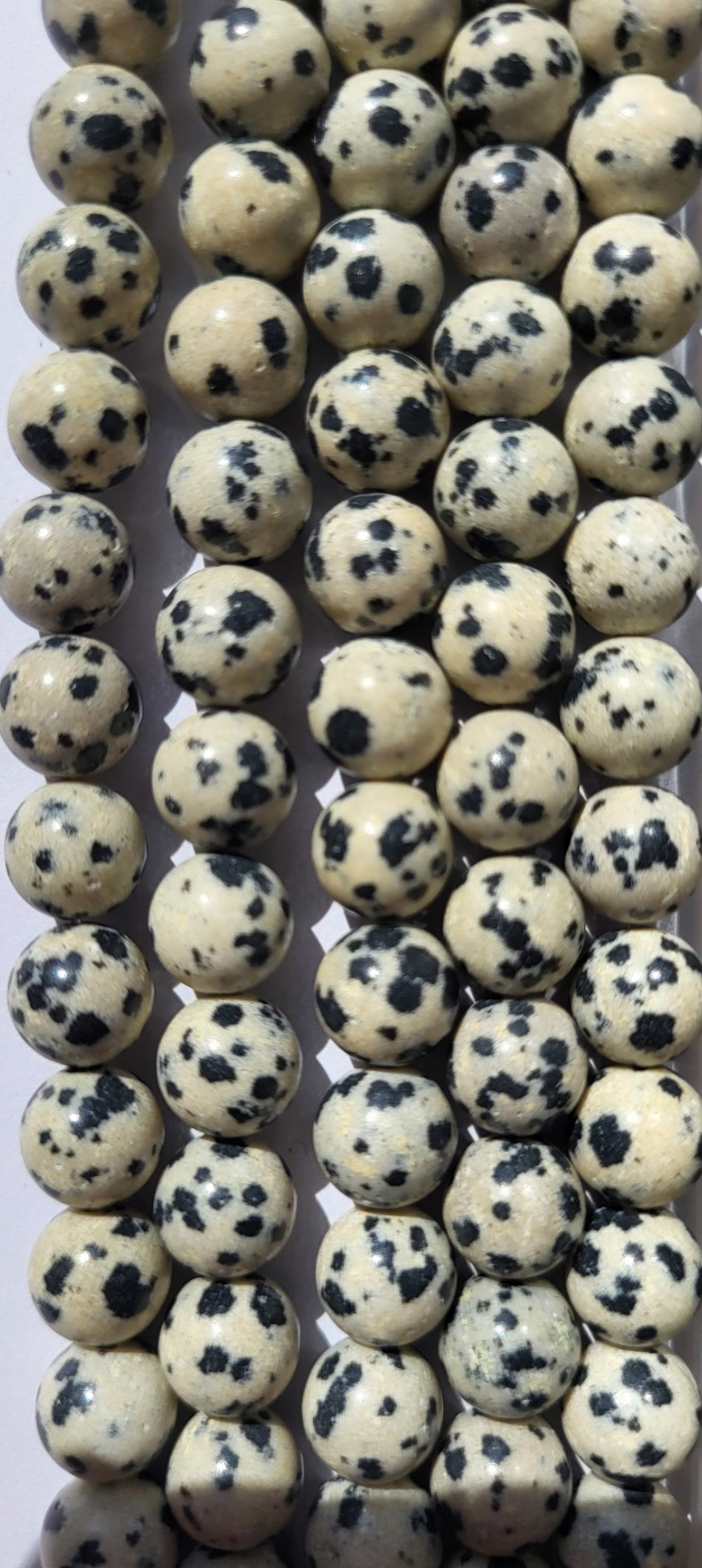 *NSR08/01a  1 natuurstenen streng *Dalmatiër jaspis* rond ca. 8mm