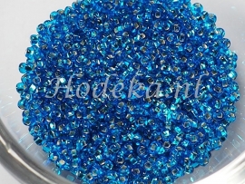 CRP11/02a  50 gram Preciosa Rocailles 11/0 Aqua Blauw Silverlined