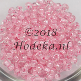 CRP06/54  12 gram Preciosa Rocailles 6/0  Transparant roze kern