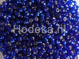 CRP10/25a  50 gram Preciosa Rocailles 10/0 donker Cornflower blauw silverlined