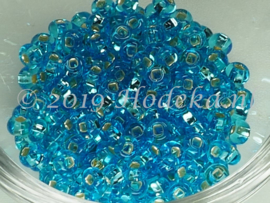 CRP06/60  12 gram Preciosa Rocailles 6/0  Licht Blauw silverlined