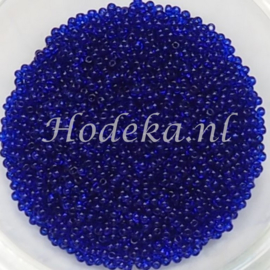 CRP15/27a  50 gram Preciosa Rocailles 15/0 Heel Donker Blauw Transparant