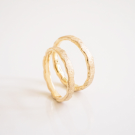 organic frosted yellow gold wedding rings