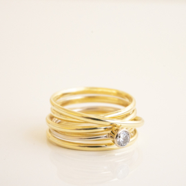 the swirl ring with solitaire